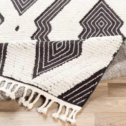 SURYA AZILA BLACK + IVORY TEXTURED PILE RUG