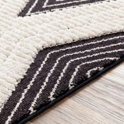 SURYA AZILA BLACK + IVORY TEXTURED PILE RUG