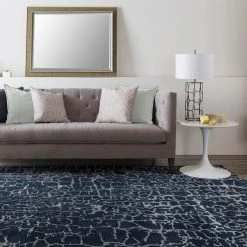 SURYA MIDNIGHT MOON WOOL RUG: NAVY