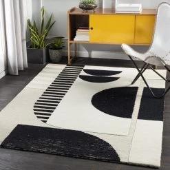 SURYA DECO MOON TUFTED WOOL RUG: BLACK, BEIGE