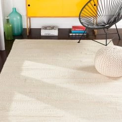 SURYA KOBY BRAIDED WOOL RUG