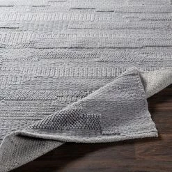 SURYA KOBY BRAIDED WOOL RUG