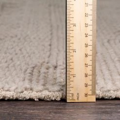 SURYA KOBY BRAIDED WOOL RUG