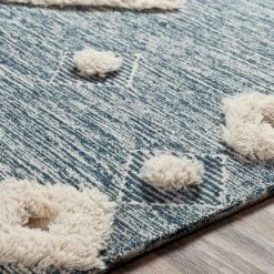 SURYA CHEROKEE BORDERED WOOL RUG: NAVY + CREAM