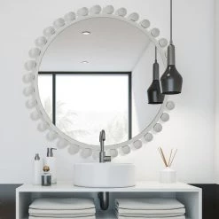 UTTERMOST CYRA 44" ROUND MIRROR: WHITE