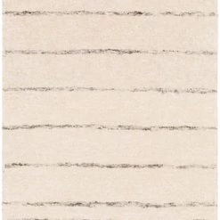 SURYA ELIAS WOOL + VISCOSE RUG: CREAM
