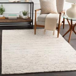 SURYA ELIAS WOOL + VISCOSE RUG: CREAM