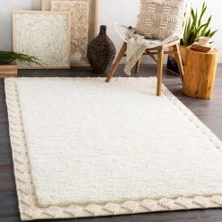 SURYA HAGUE PLUSH WOOL BORDER RUG: CREAM