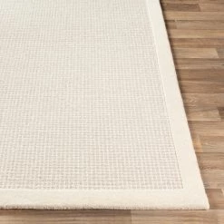 SURYA HAND TUFTED WOOL BORDER RUG: CREAM