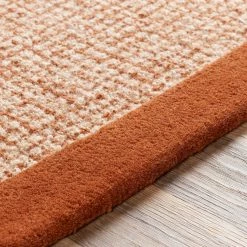 SURYA HAND TUFTED WOOL BORDER RUG: RUST