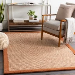 SURYA HAND TUFTED WOOL BORDER RUG: RUST