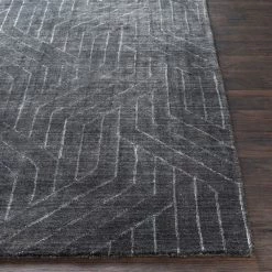 SURYA AKIDO VISCOSE RUG: CHARCOAL