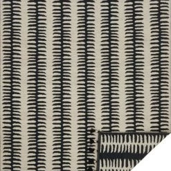 LOLOI KAHELO REVERSIBLE TASSEL RUG: BLACK + GREY