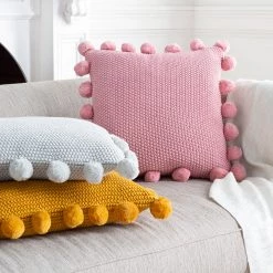 SURYA Pillows + Decor KNITTED COTTON POM PILLOW