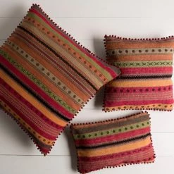 SURYA RENA POM PILLOW Pillows + Decor