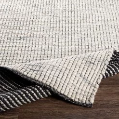 SURYA NUBBY WOVEN WOOL RUG: IVORY, BLACK