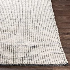 SURYA NUBBY WOVEN WOOL RUG: IVORY, BLACK
