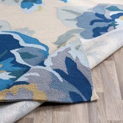 SURYA IN BLOOM OUTDOOR RUG: BLUE, KHAKI