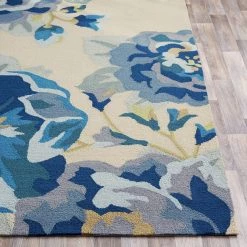 SURYA IN BLOOM OUTDOOR RUG: BLUE, KHAKI