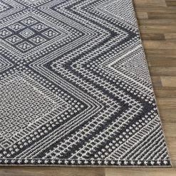 SURYA RADKA INDOOR-OUTDOOR RUG: CHARCOAL + WHITE