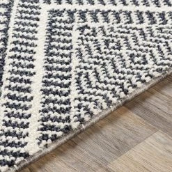 SURYA RADKA INDOOR-OUTDOOR RUG: CHARCOAL + WHITE