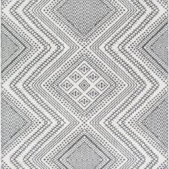 SURYA RADKA INDOOR-OUTDOOR RUG: CHARCOAL + WHITE