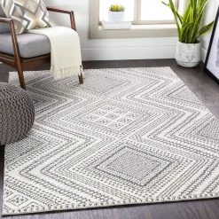 SURYA RADKA INDOOR-OUTDOOR RUG: CHARCOAL + WHITE