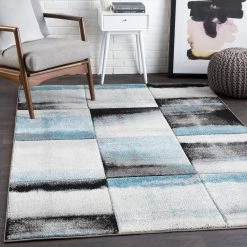 SURYA PASCALA RUG: OCEAN, BLACK