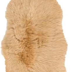SURYA SHEEPSKIN HIDE RUG: CAMEL