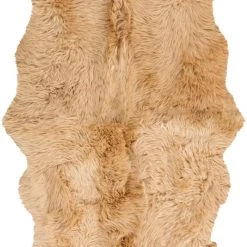 SURYA SHEEPSKIN HIDE RUG: CAMEL