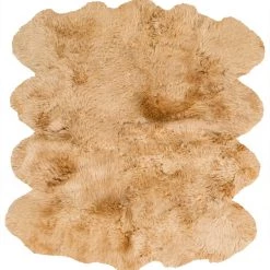 SURYA SHEEPSKIN HIDE RUG: CAMEL