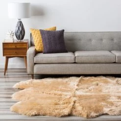 SURYA SHEEPSKIN HIDE RUG: CAMEL