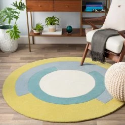 SURYA SPINNER ROUND WOOL RUG: LIME, AQUA