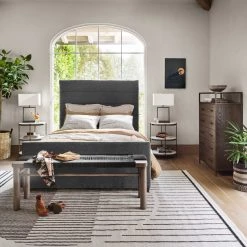 FOUR HANDS THREE TIER OVAL END TABLE