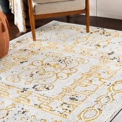 SURYA NICHELLE RUG: YELLOW, ICE BLUE, BLACK