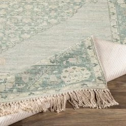 SURYA NORA DISTRESSED VINTAGE PRINT RUG: SAGE