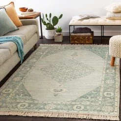 SURYA NORA DISTRESSED VINTAGE PRINT RUG: SAGE