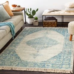 SURYA NORA DISTRESSED VINTAGE PRINT RUG: AQUA