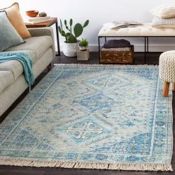 SURYA NEVAEH DISTRESSED VINTAGE PRINT RUG: AQUA